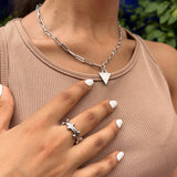 Female wearing padlock necklace in silver , engraved with Affirmation lock in. Stacked with a booble ring in silver