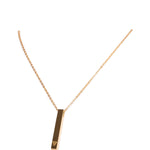 Back of gold empowering rectangular necklace